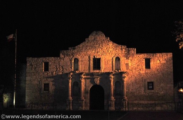 Night view of the Alamo, showcasing its haunting beauty