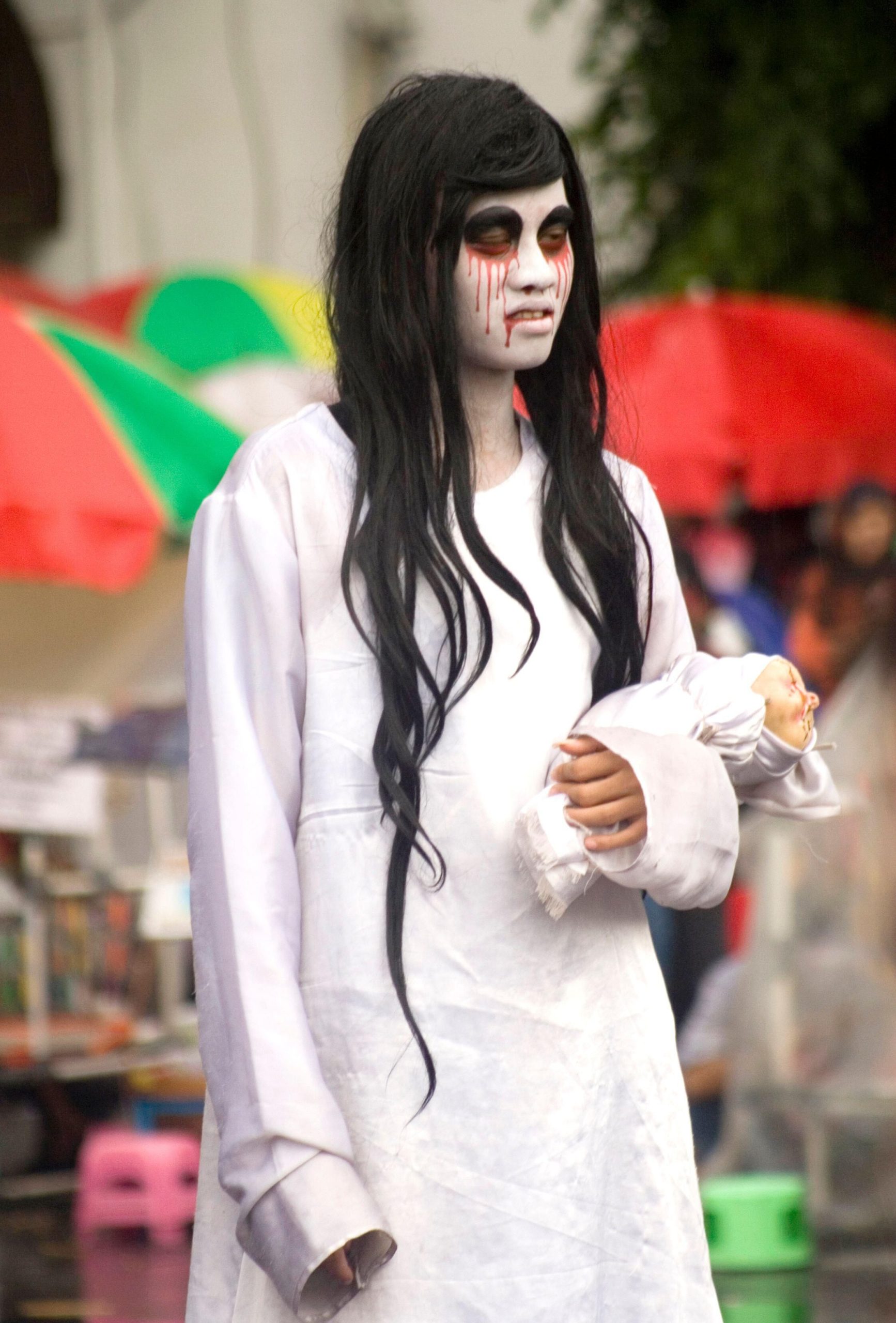 A traditional representation of the Pontianak ghost, capturing the ethereal beauty and eerie nature of this spirit.