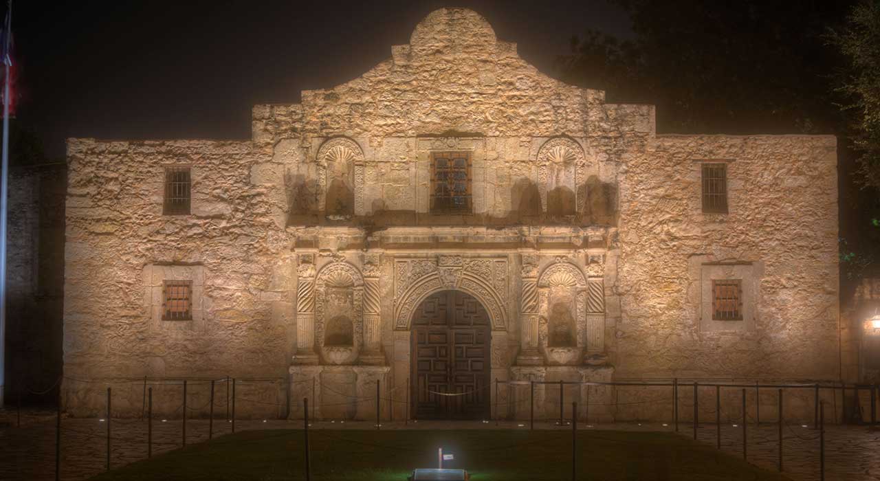 The eerie atmosphere of the Haunted Alamo at night