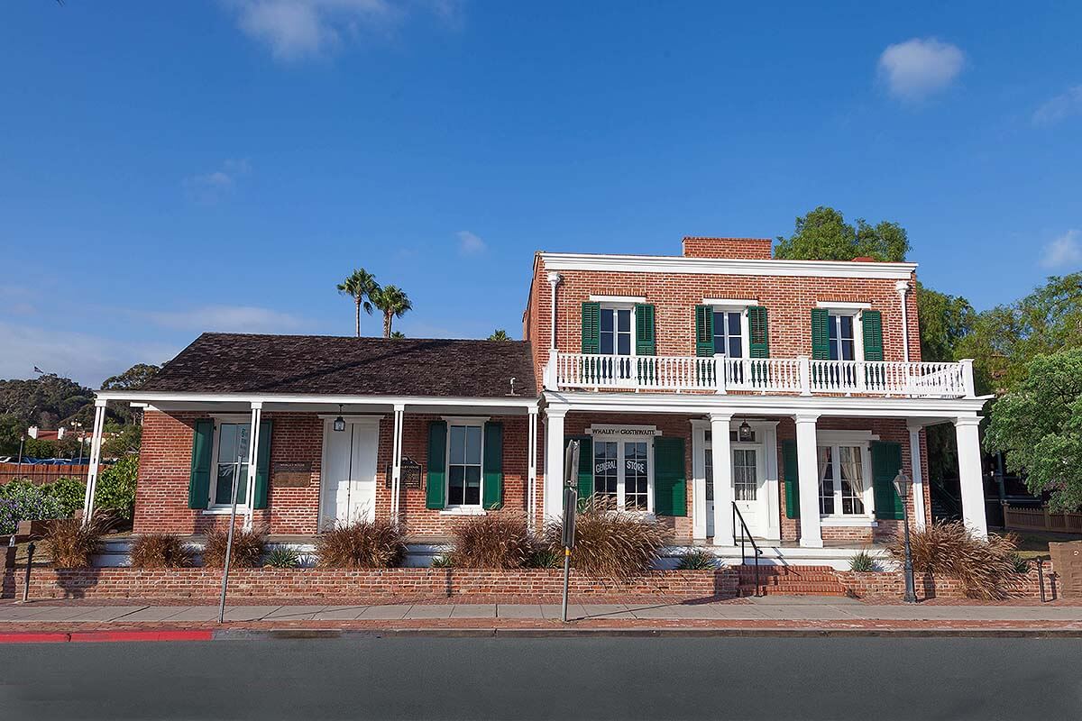 Whaley House in daylight, showcasing its architecture and spookiness.