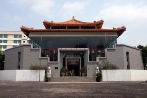 Gathering at the cemetery for the Hungry Ghost Festival, illustrating community interactions during ancestral veneration