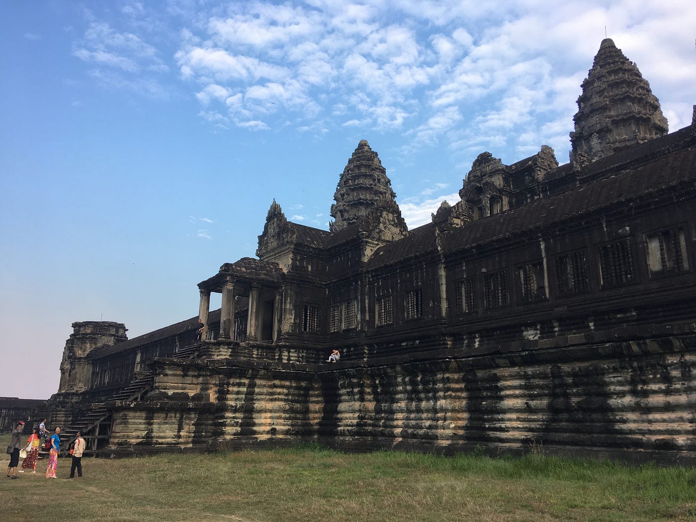 Spectral silhouette of ghosts enhancing the atmosphere of Angkor Wat.