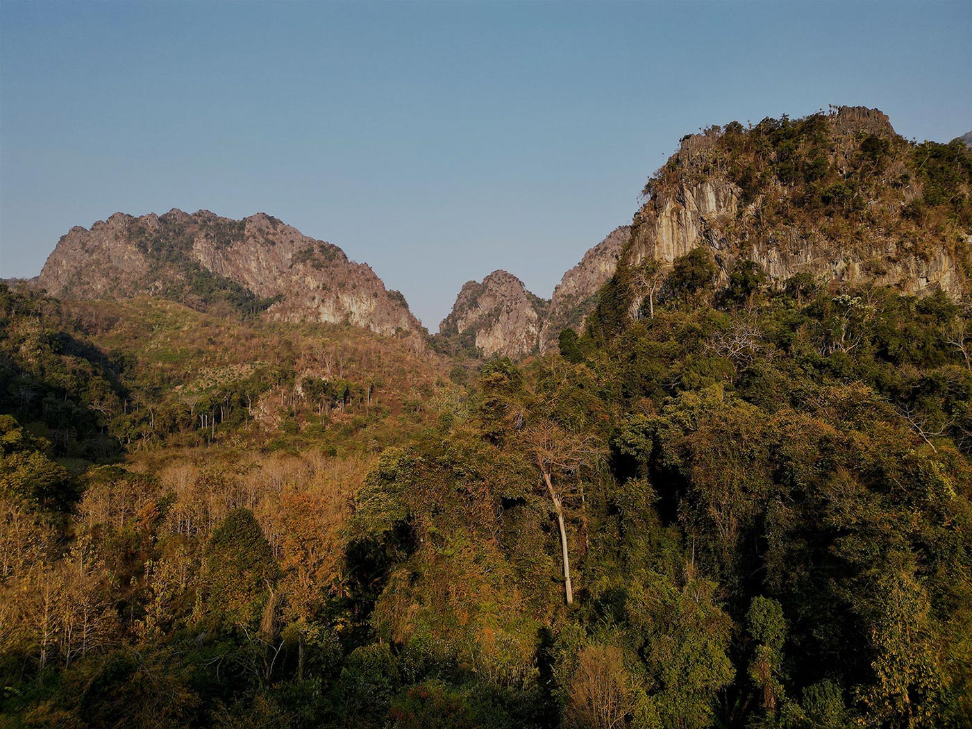 A secluded view of the Lao landscape emphasizing the mystical aura essential to ghostly tales.