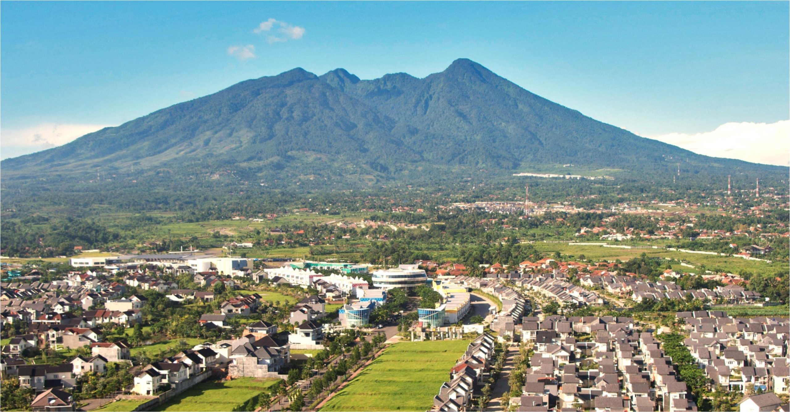 An expansive view of Mount Salak showcasing its majestic presence, essential in presenting the spiritual folklore around the region.