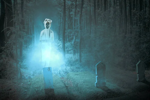 Pocong Covered White Linen Shroud in Cemetery