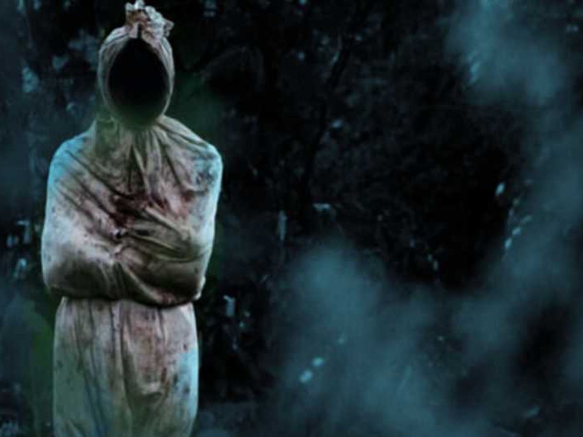 An image of 'pocong,' a well-known ghost from Malay folklore, ideal to represent the chilling stories of Malam Jumaat.