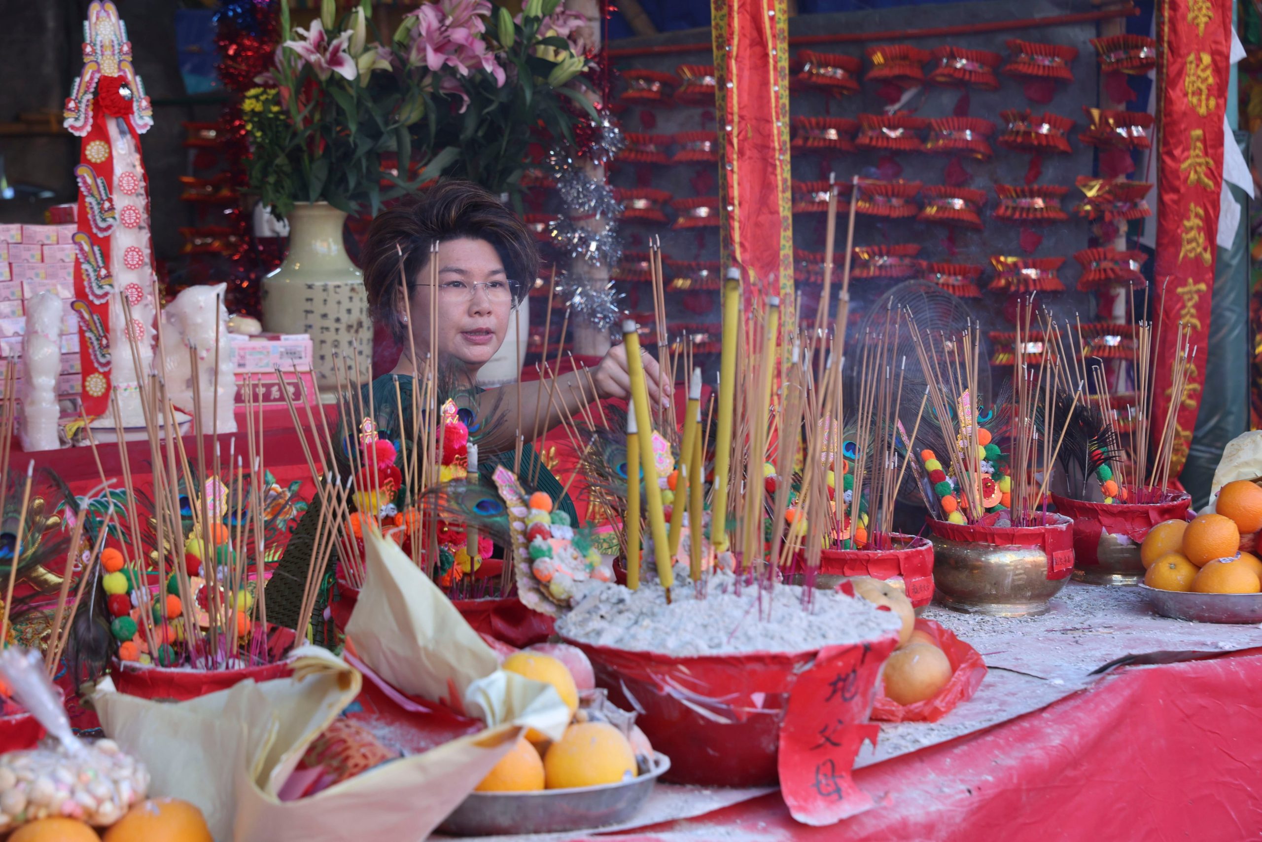 Incense and offerings arranged thoughtfully during the Hungry Ghost Festival in Taiwan.