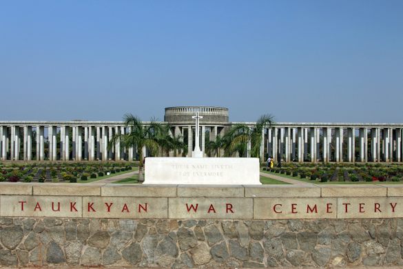 A view of a Taukkyan War Cemetery showcasing the somber architecture synonymous with memorials reflective of Myanmar's cultural respect for the dead.