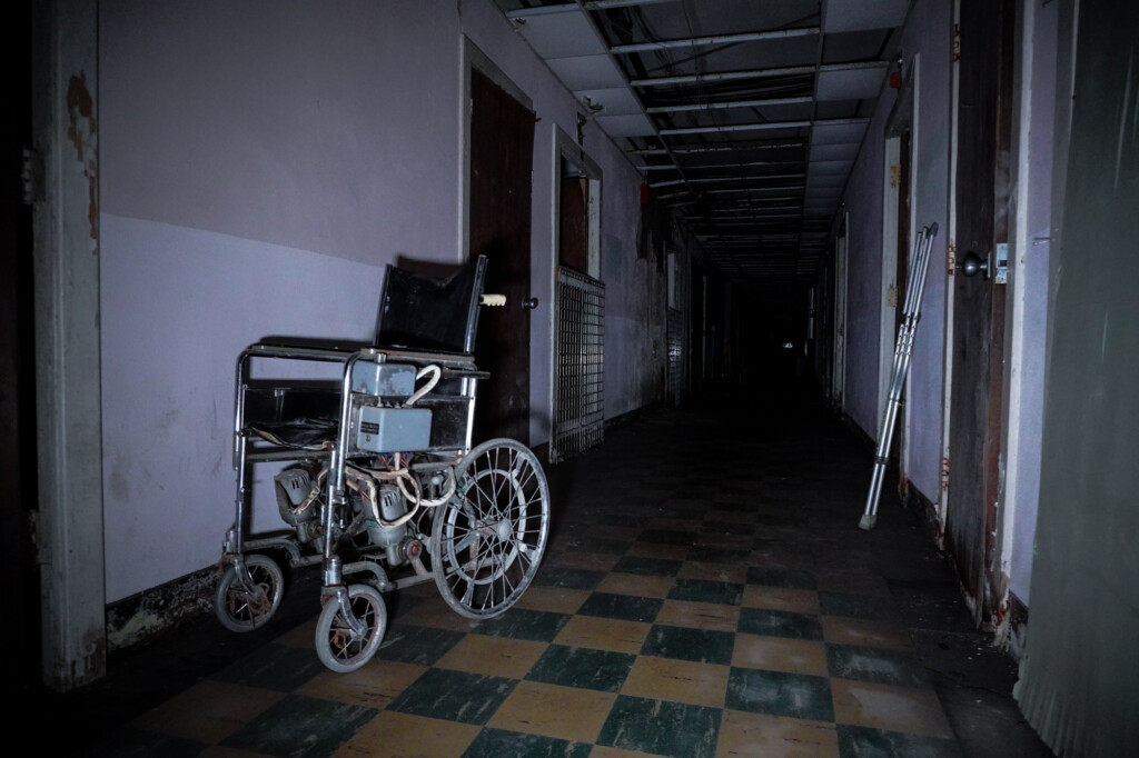 A ghostly view of an abandoned medical facility, integrating well with themes of loss and history.