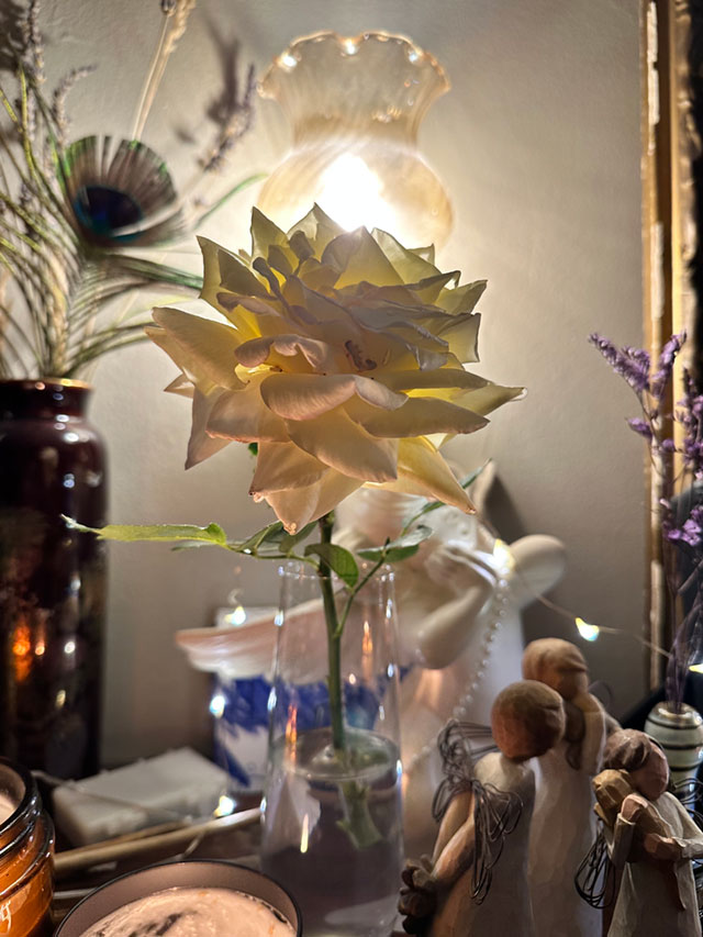 An artistic representation of an altar set up to honor ancestors with seasonal offerings in an autumn setting.