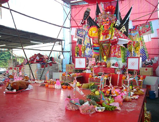 Food offerings at the Hungry Ghost Festival, showcasing the traditional offerings prepared for ancestors.