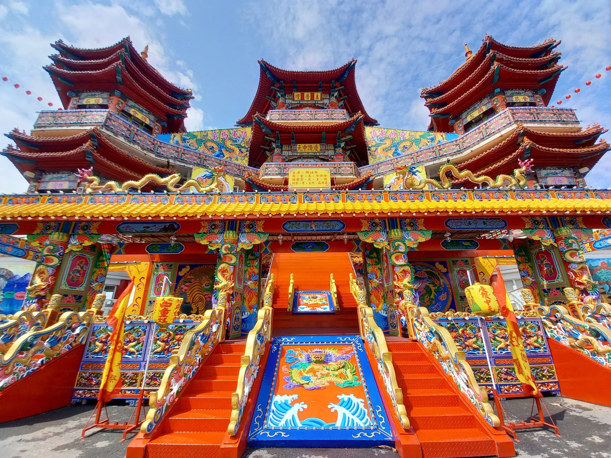 A captivating representation of the Keelung Mid-Summer Ghost Festival with beautifully arranged decorations and offerings on display.