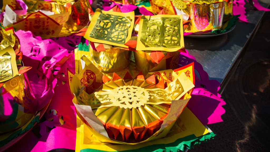 Traditional offerings of joss paper prepared for the spirits during ghostly nights.