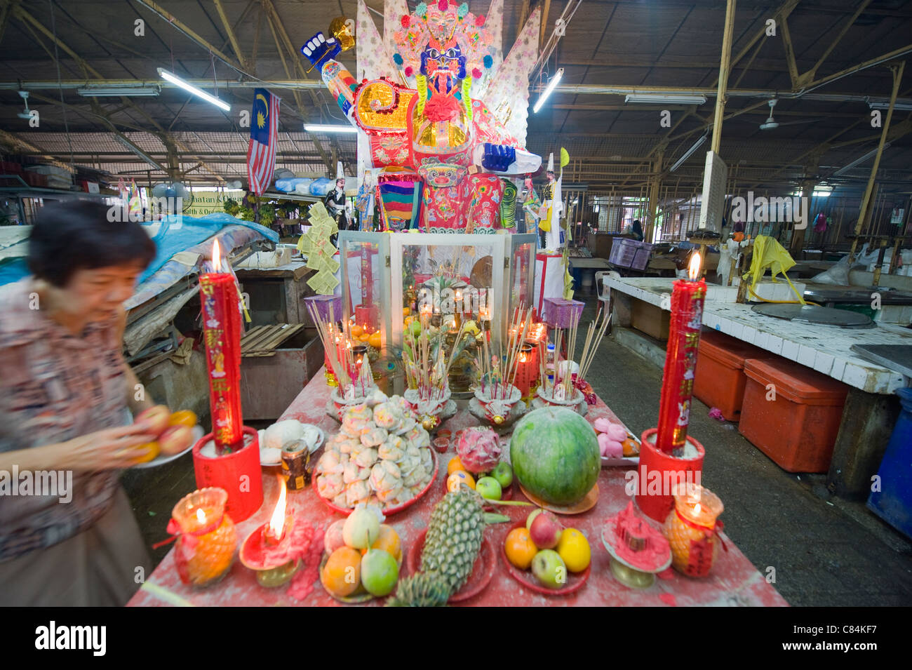 Various offerings laid out during the Hungry Ghost Festival in Georgetown, Penang, reflecting the cultural practices.