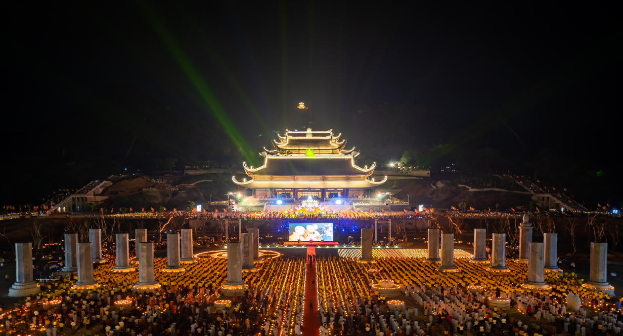 The iconic view of a Vietnamese pagoda surrounded by offerings during the Hungry Ghost Month