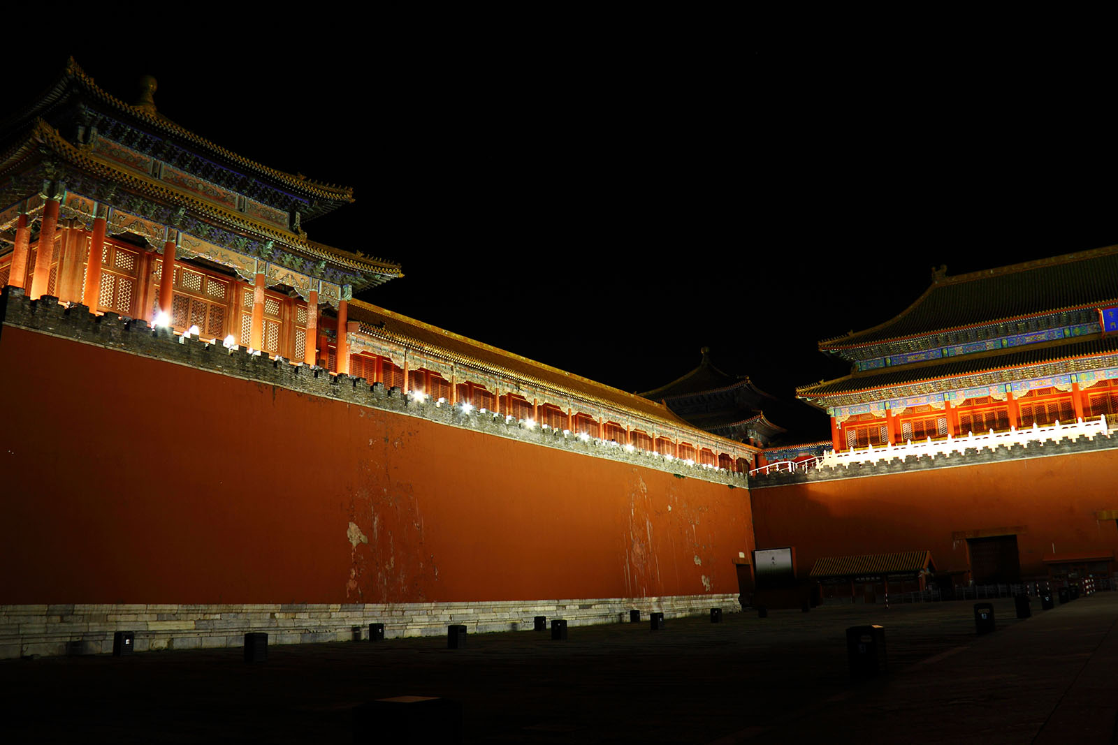 Eerie night view of the Forbidden City, enhancing the ghostly ambiance